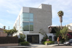 A building with a large window on the side of it.