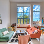 A living room with two couches and a table